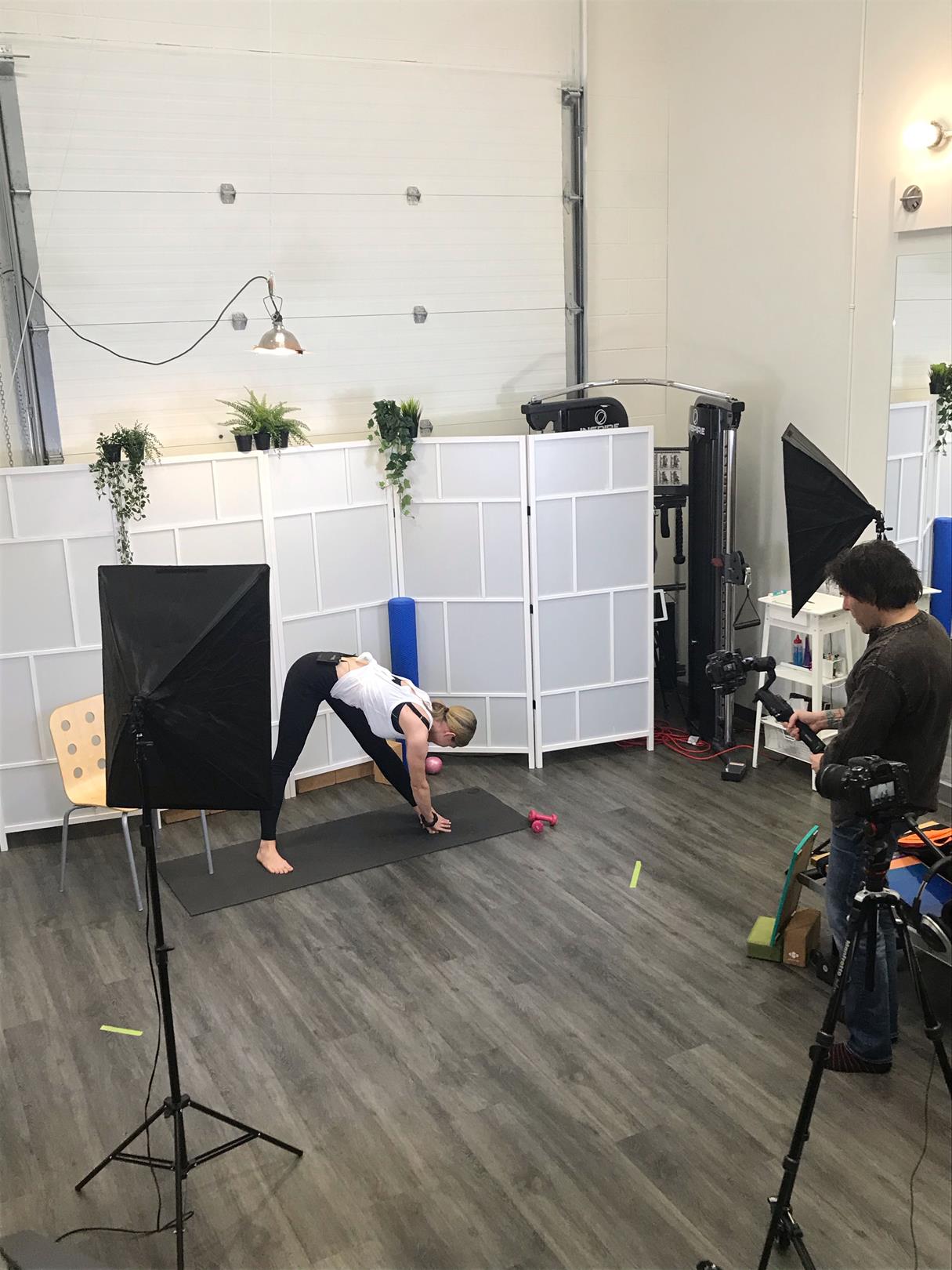 Cameras filming woman exercising